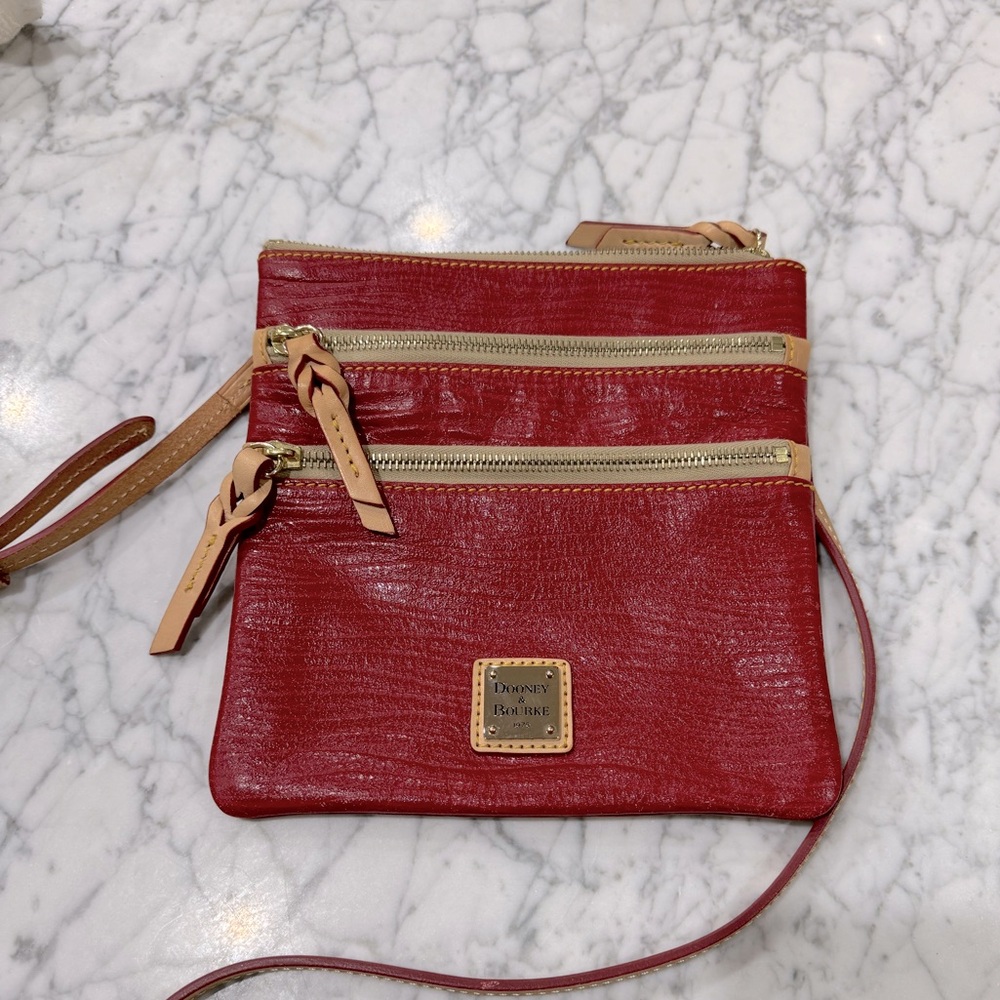 Dooney & Bourke leather red crossbody with three pockets